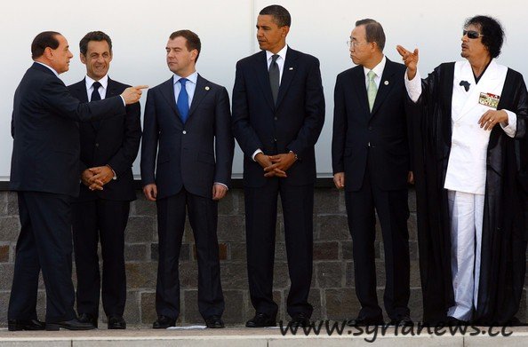 Gaddafi with Ban Ki-moon, Obama, Medvedev, Berlusconi and Sarkozy.