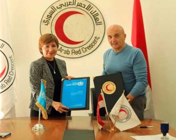 WHO representative Dr. Magtymova (L) was received in Damascus, by SARC head Khaled Haboubati.
