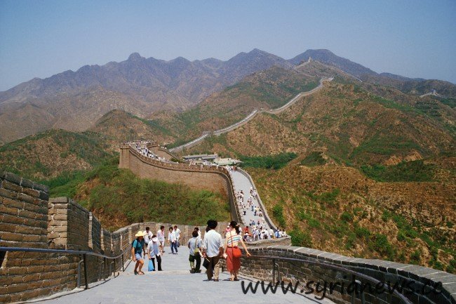 Visitors Walk Along the Great Wall