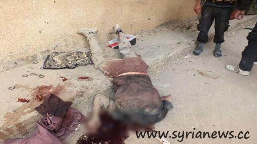 The first victim: You can see the Syrian flag in the background of the picture.