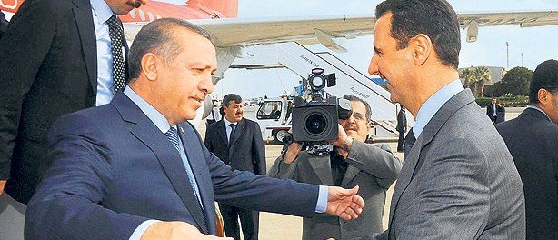 Syrian President Dr. Bashar Assad (right) sincerely welcoming Caliph wannabe Erdoğan (left with obvious fake feelings)