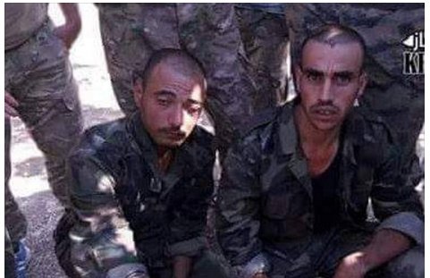 SAA soldiers before beheading.jpg