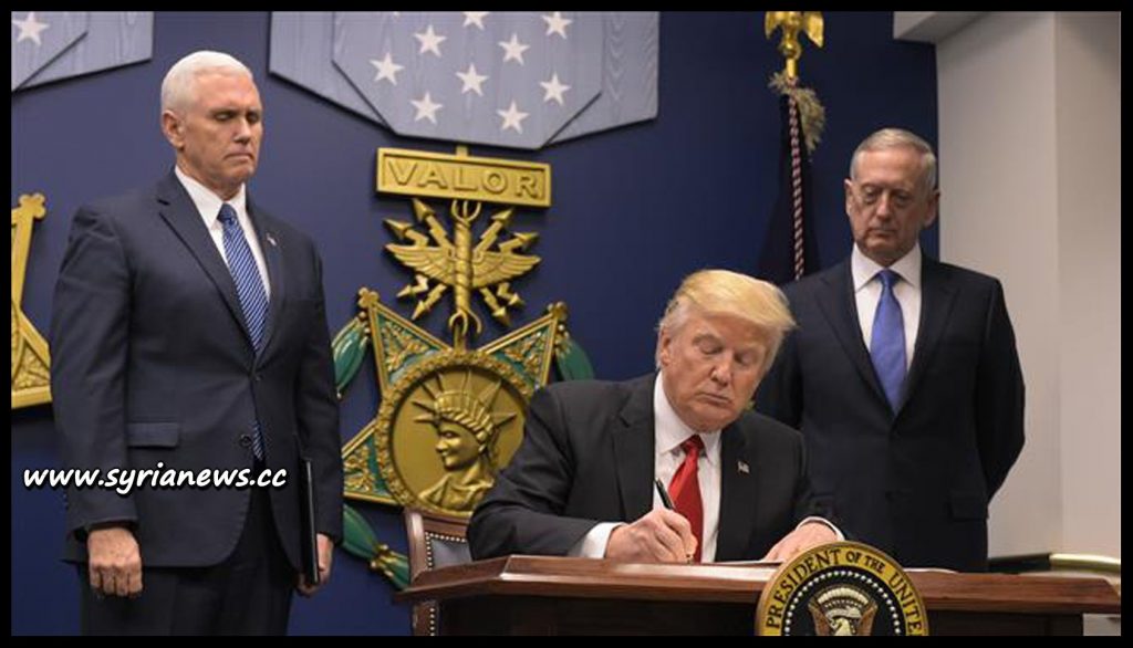 image-Trump Signing Executive Order Banning Muslims from 7 Countries Entry to USA