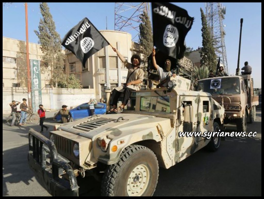 image-ISIS Terrorists parading US weapons