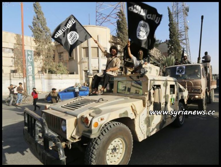 image-ISIS Terrorists parading US weapons