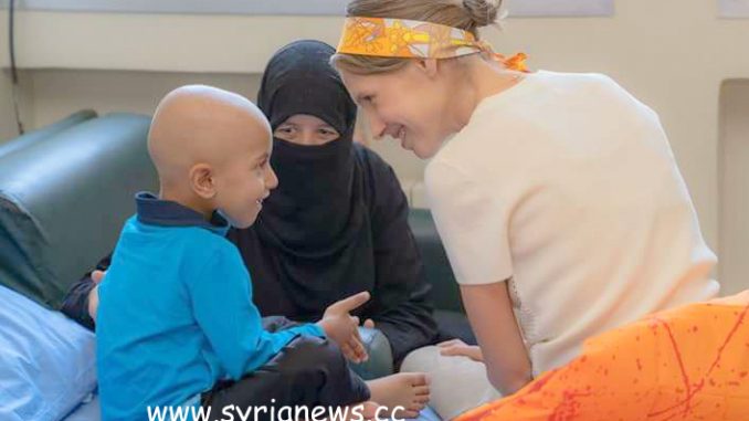 Syria's First Lady Asma Al-Assadvisits pediatric cancer center on the first day of Eid l-Adha.