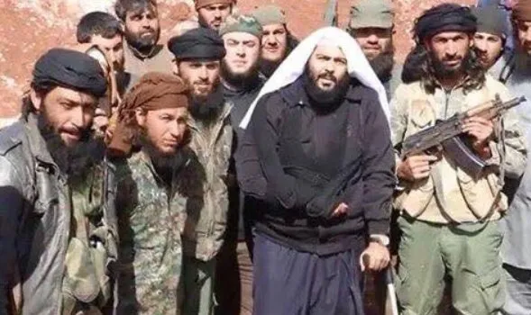 Group foto of Idlib civilians includes Saudi terrorist Muhaysini, on US's SDN terror list.
