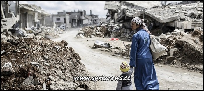 Syrian woman with her child in the rubble Damascus, Aleppo, Der Ezzor, Raqqa, Daraa, Sweida, Idlib, Hama, Homs