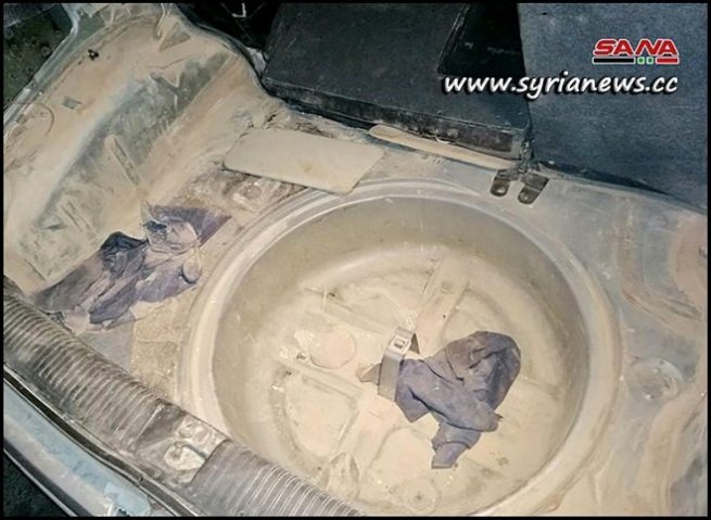 Trunk of the booby-trapped car dismantled in Al-Zahraa district - Homs - Syria