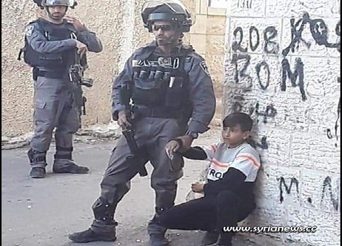 Israeli IDF terrorists kidnap a Palestinian child of 11 years old in Isawiya near Jerusalem