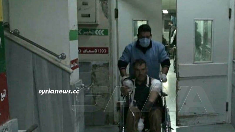 injured man of the isis terrorist attack on buses on Salamiyah - Ithriyah road in Hama