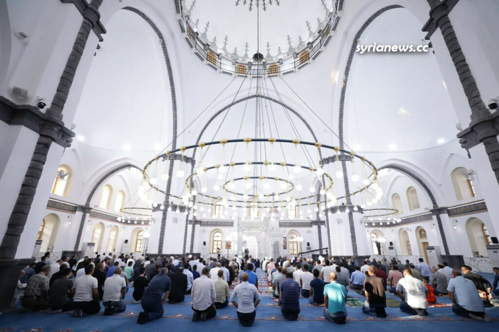 President Bashar Assad performs Eid Adha prayers in Khalid Ibn Al Waleed Mosque in Homs