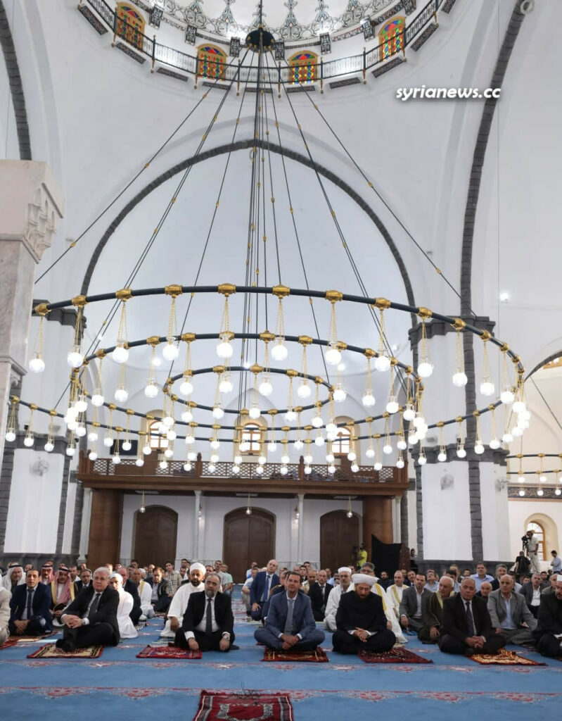 President Bashar Assad performs Eid Adha prayers in Khalid Ibn Al Waleed Mosque in Homs