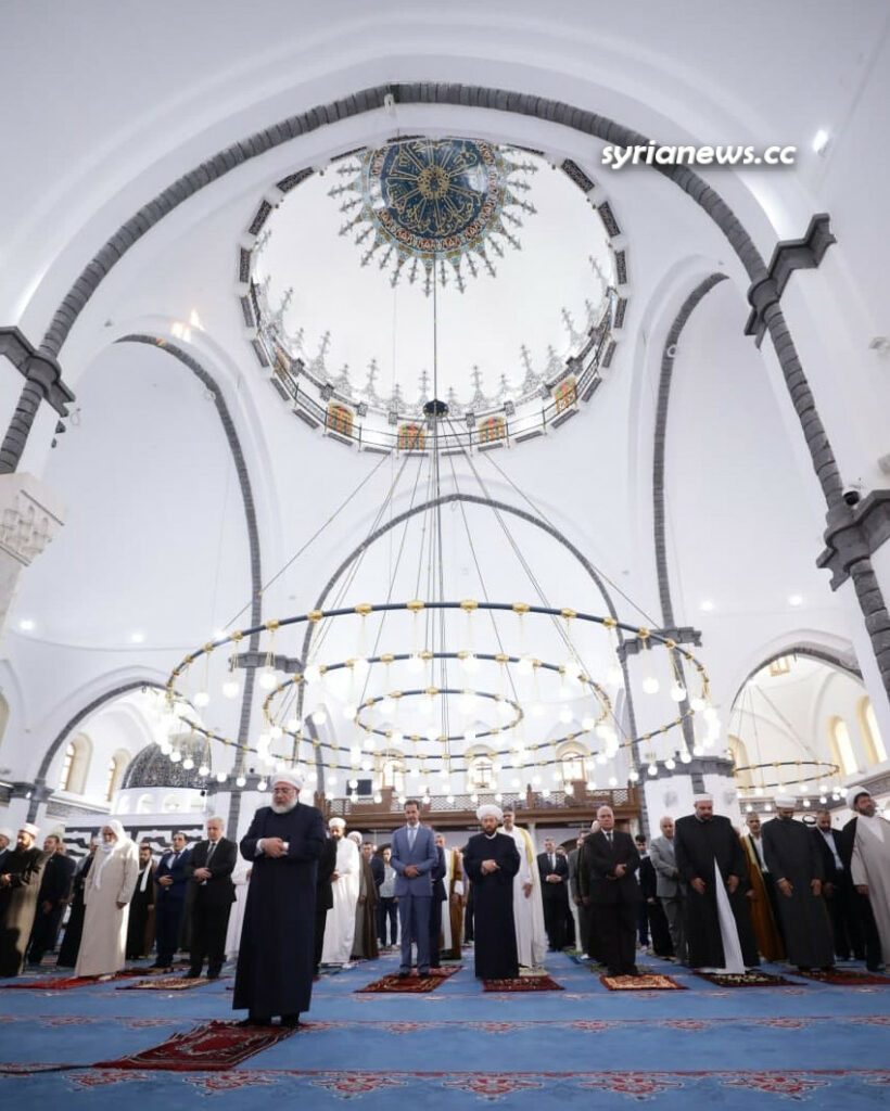 President Bashar Assad performs Eid Adha prayers in Khalid Ibn Al Waleed Mosque in Homs