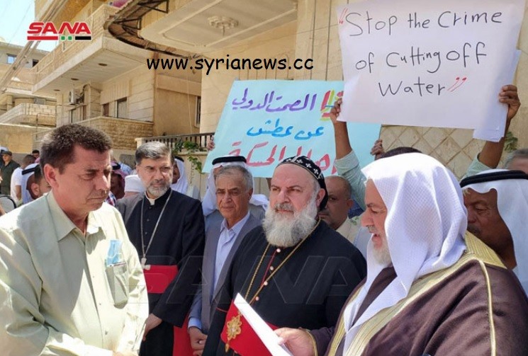 Dozens of Syrian civilians condemned water war crime at ICRC .