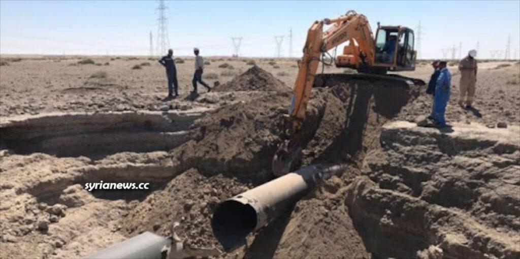 Maintenance teams repairing the Arabian gas pipeline near Deir Ali station blown up by ISIS