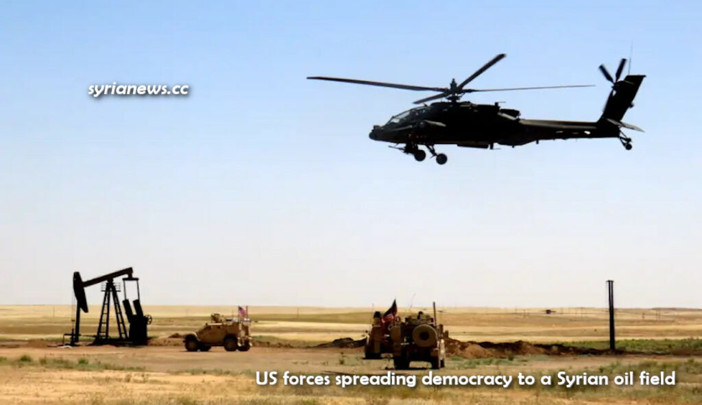 US army armored vehicles and helicopter democratizing Syrian oil field