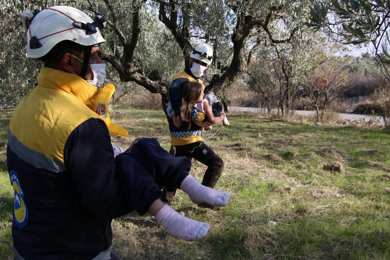 Walking through a park-like area carrying shoeless, kidnapped children also does not help create the stage for a false flag chemical attack.