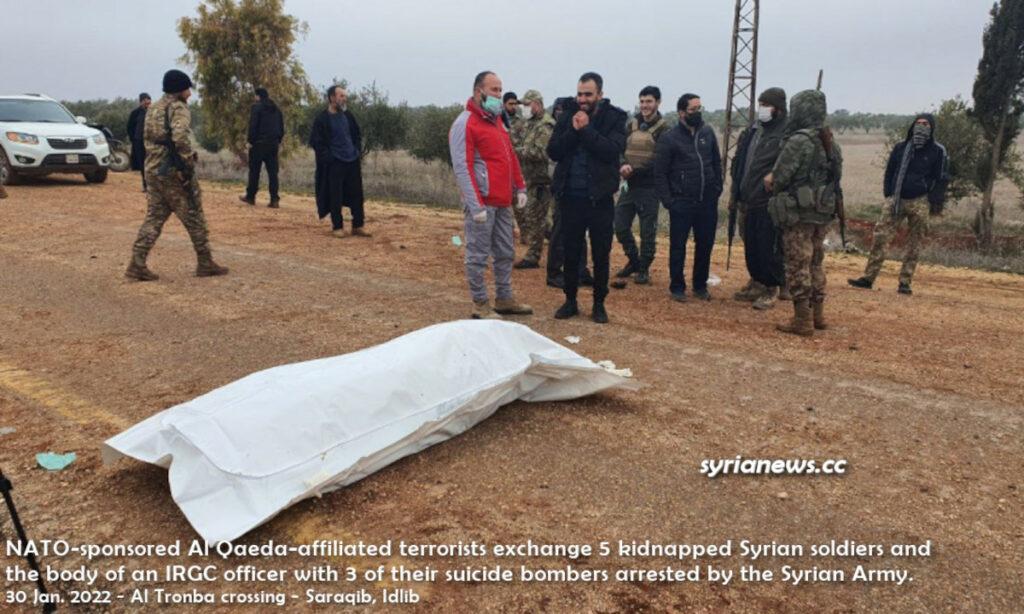 NATO-sponsored Al Qaeda-affiliated terrorists exchange 5 kidnapped Syrian soldiers and the body of an IRGC officer with 3 of their suicide bombers arrested by the Syrian Army. 30 Jan. 2022 - Al Tronba crossing - Saraqib, Idlib