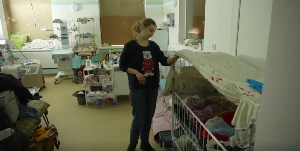 "Ukraine war": Woman looks sad watching neonates scream.