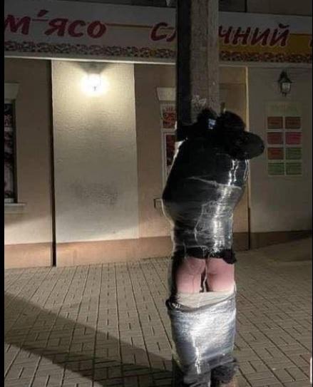Ukraine Nazis anally rape men with foreign object.