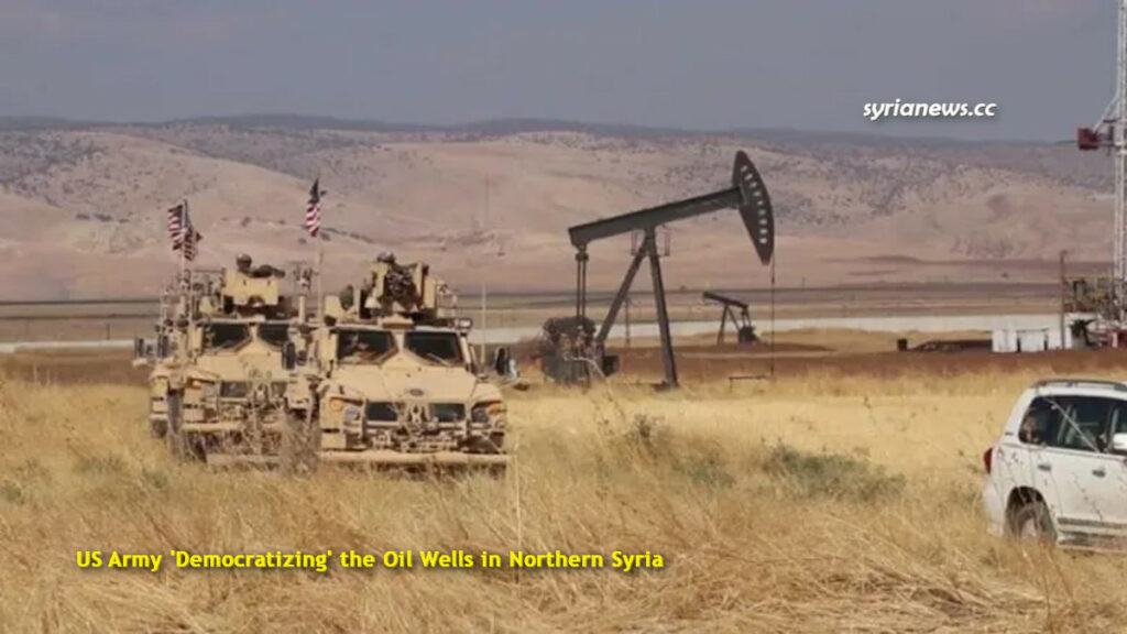 Biden Forces of the US Army democratizing - stealing Syrian oil wells الجيش الأمريكي يسرق النفط السوري