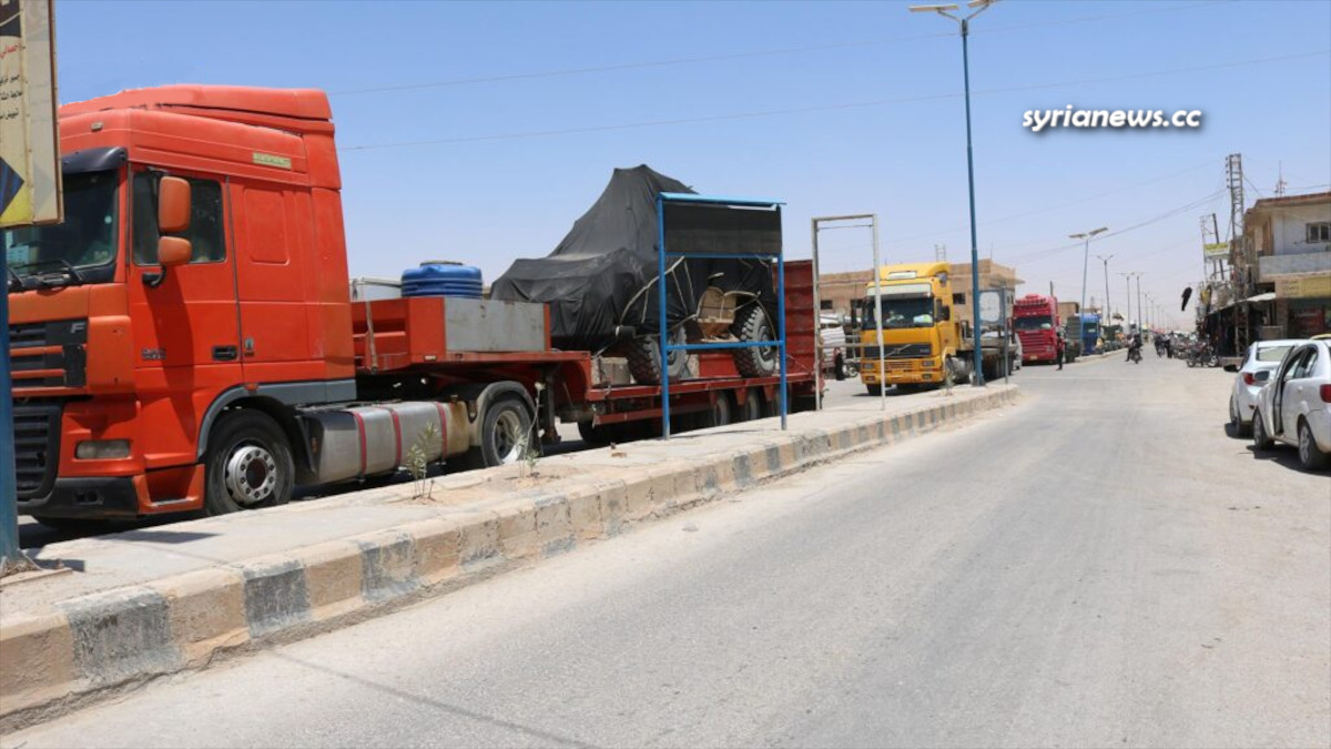 US forces smuggles dozens of trucks laden with weapons - armored vehicles and military gears into Syria from Iraq