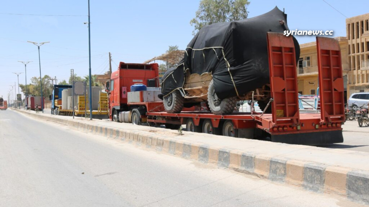 US forces smuggles dozens of trucks laden with weapons - armored vehicles and military gears into Syria from Iraq